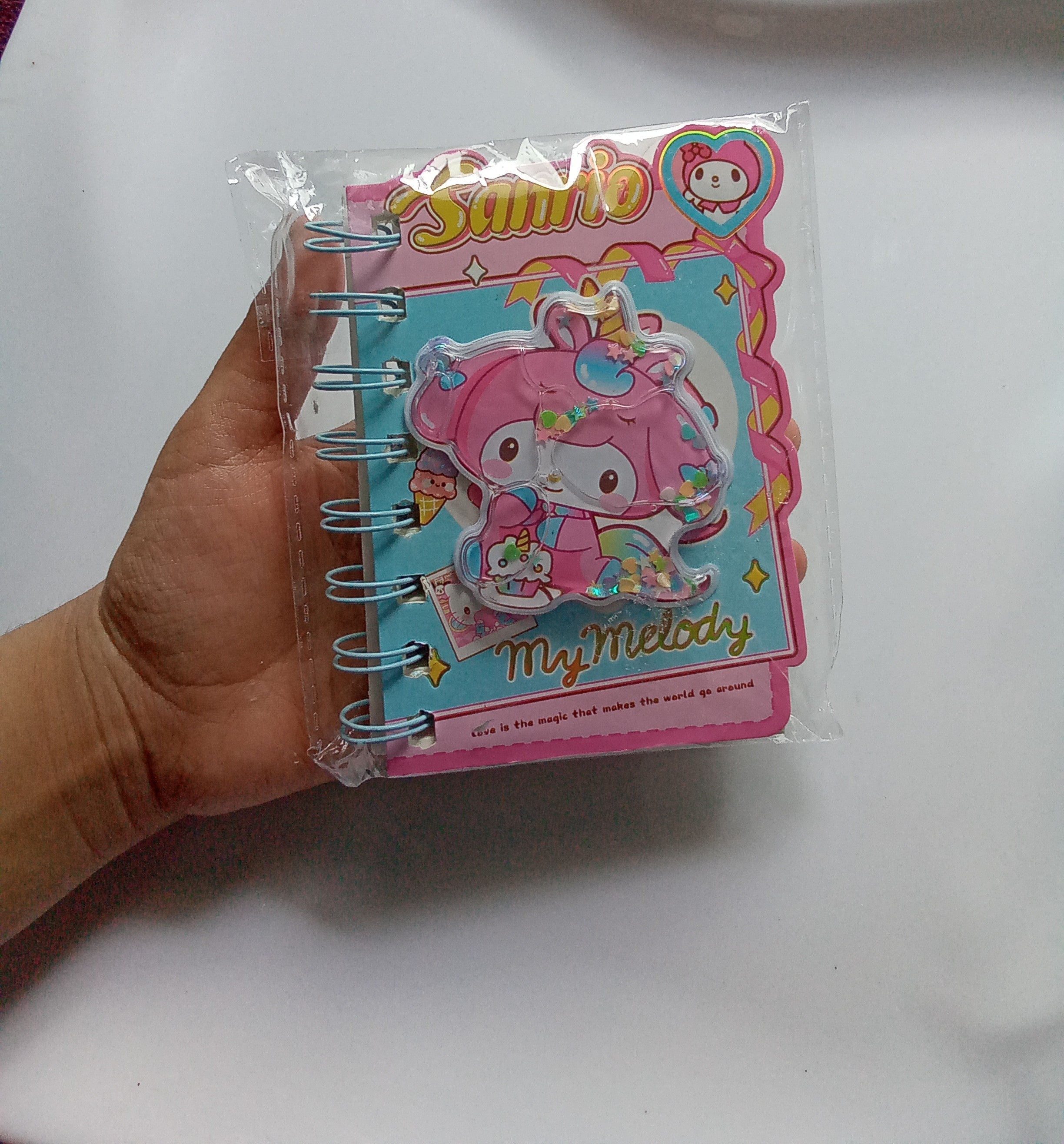 Pastel My Melody notebook with shaker